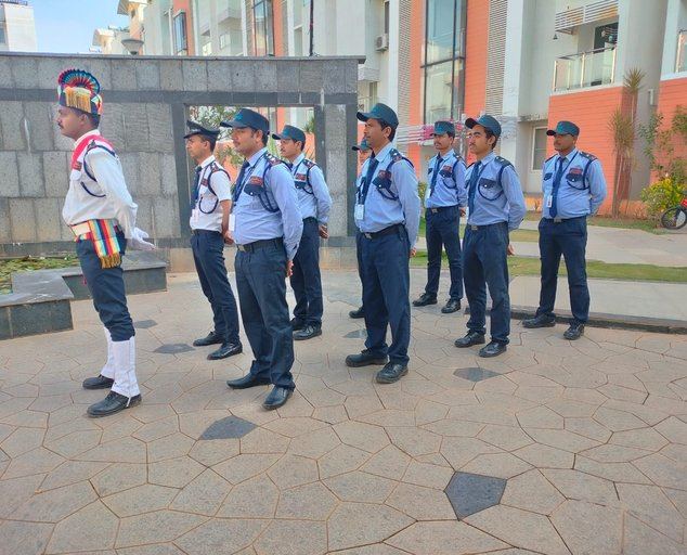Difesa Security guards standing in formation at a client site